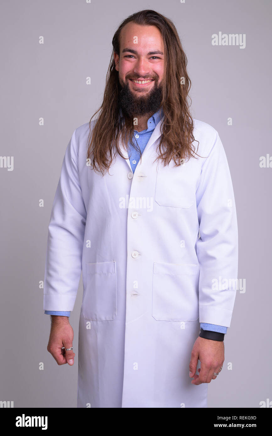 Young unshaven male doctor hi-res stock photography and images - Alamy