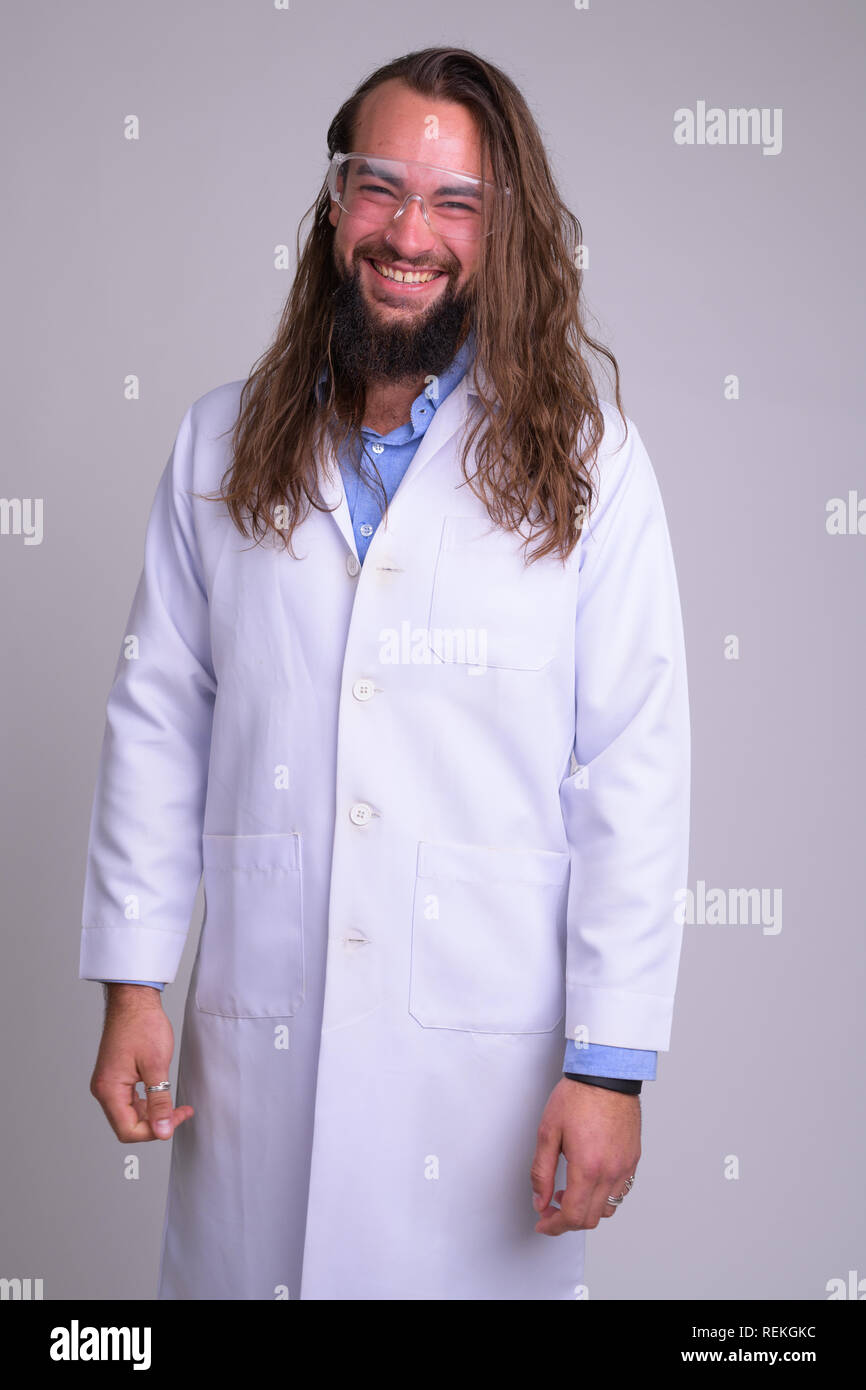 Young unshaven male doctor hi-res stock photography and images - Alamy