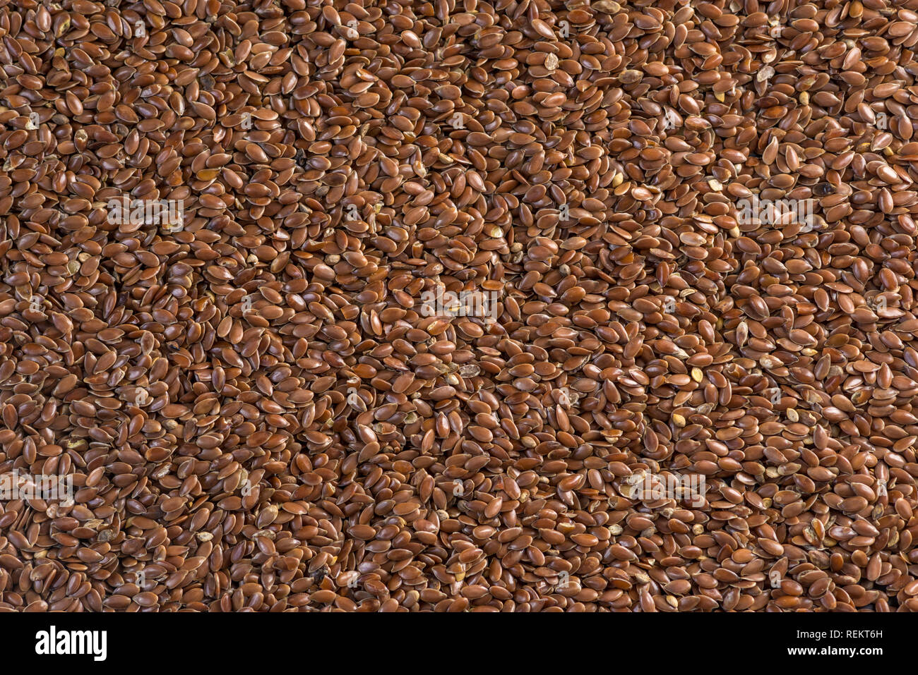 Flax seeds in the form of background. Concept healthy diet with omega 3
