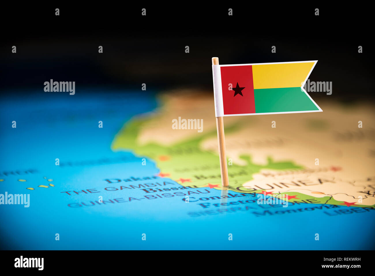 Guinea Bissau marked with a flag on the map Stock Photo