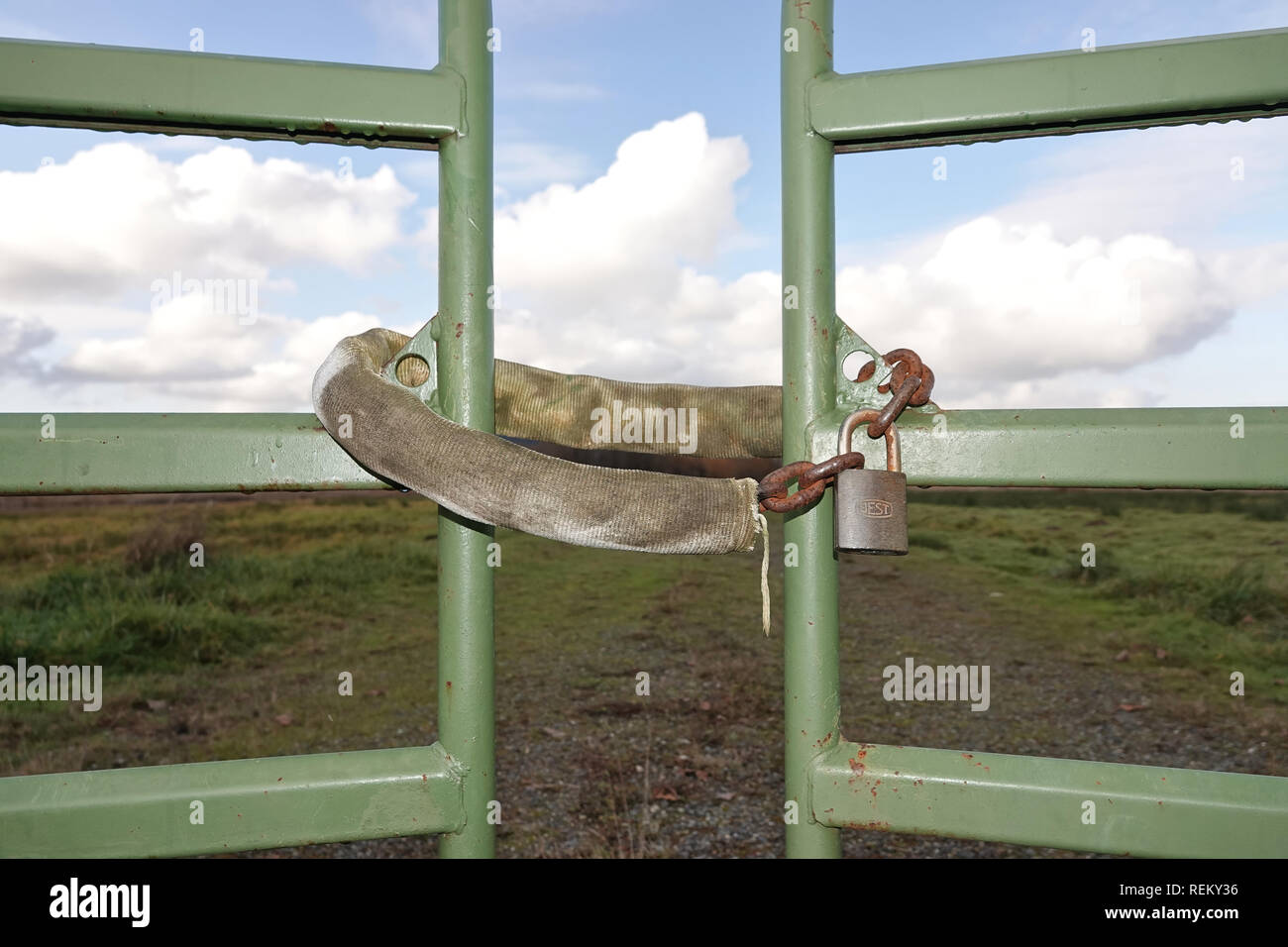 Closed and locked gates Stock Photo