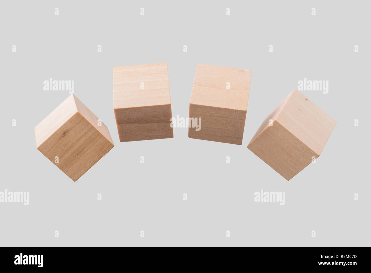 Business & design concept - Abstract geometric real floating wooden cube isolated on background, it's not 3D render. Stock Photo