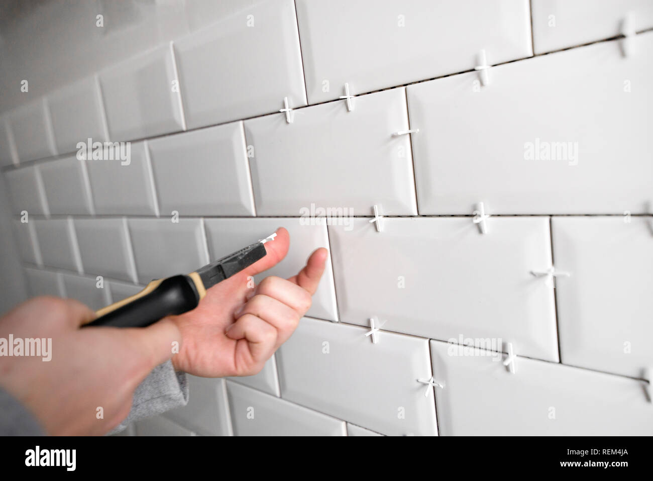 Ceramic tile lying. Installing new subway or metro tile in bathroom