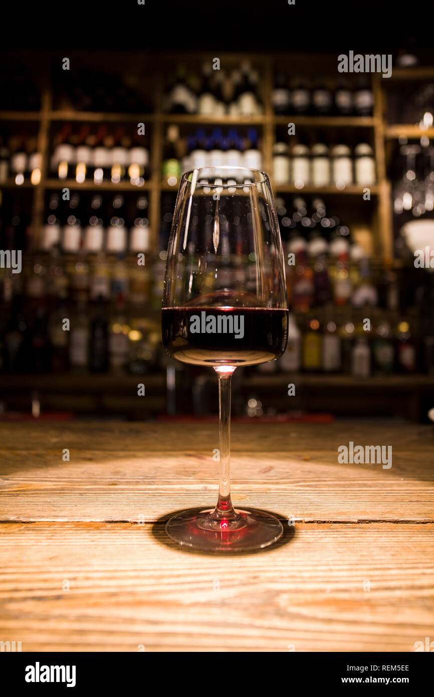 Glass of wine on a bar Stock Photo