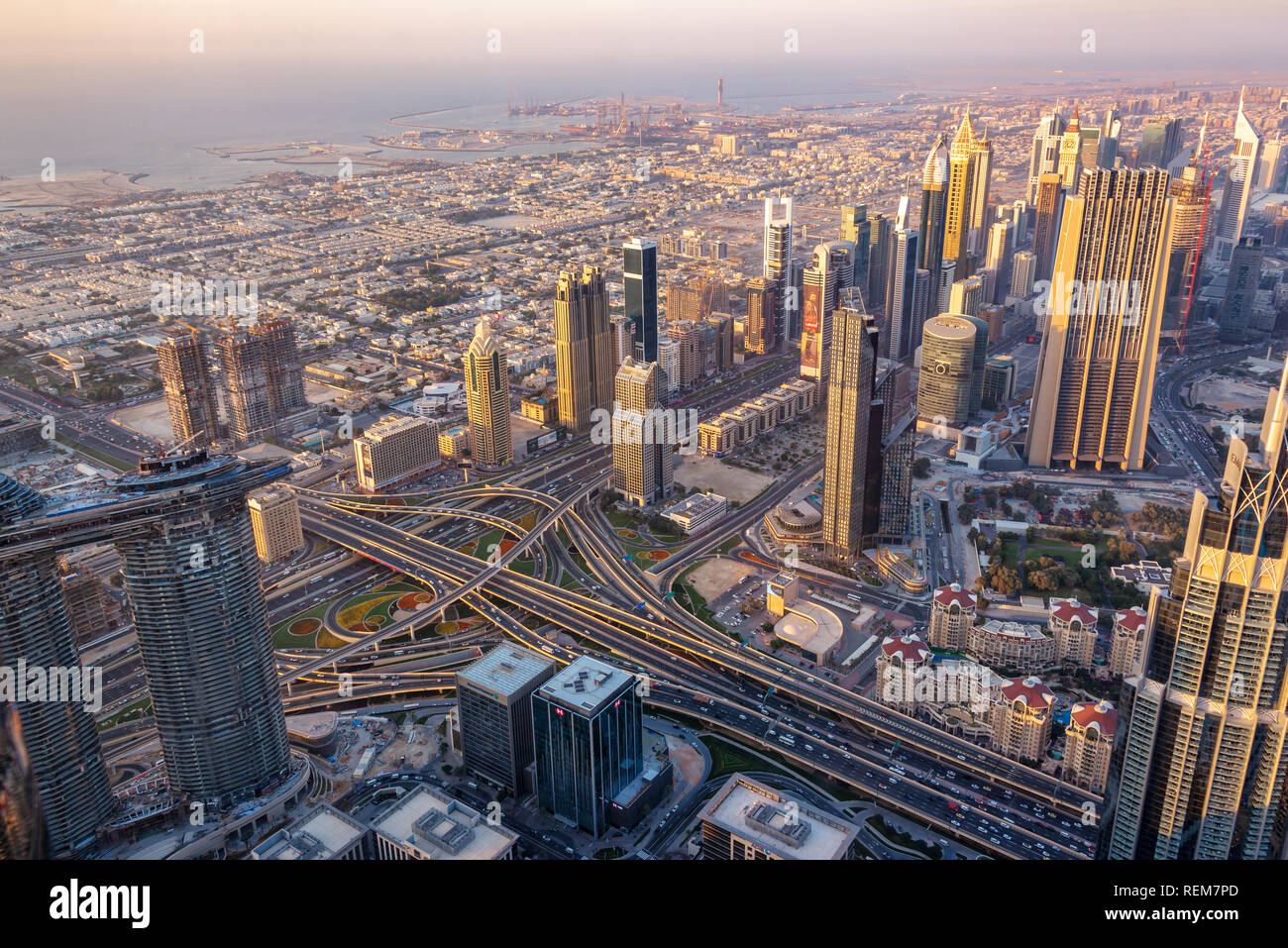 Aerial view of Dubai at sunset seen from Burj Khalifa tower, United Arab Emirates Stock Photo