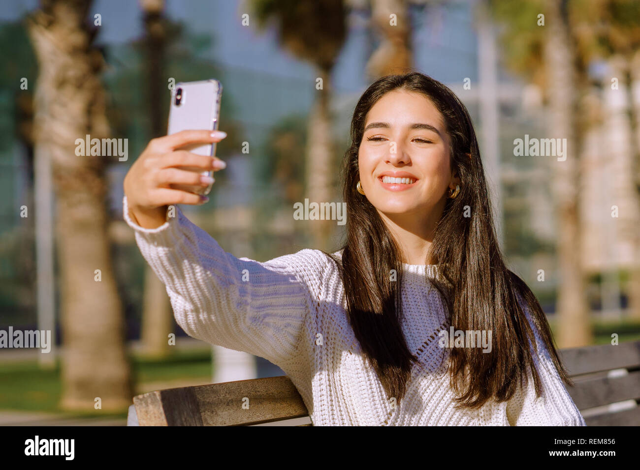 happy young woman taking a selfie - image Stock Photo - Alamy