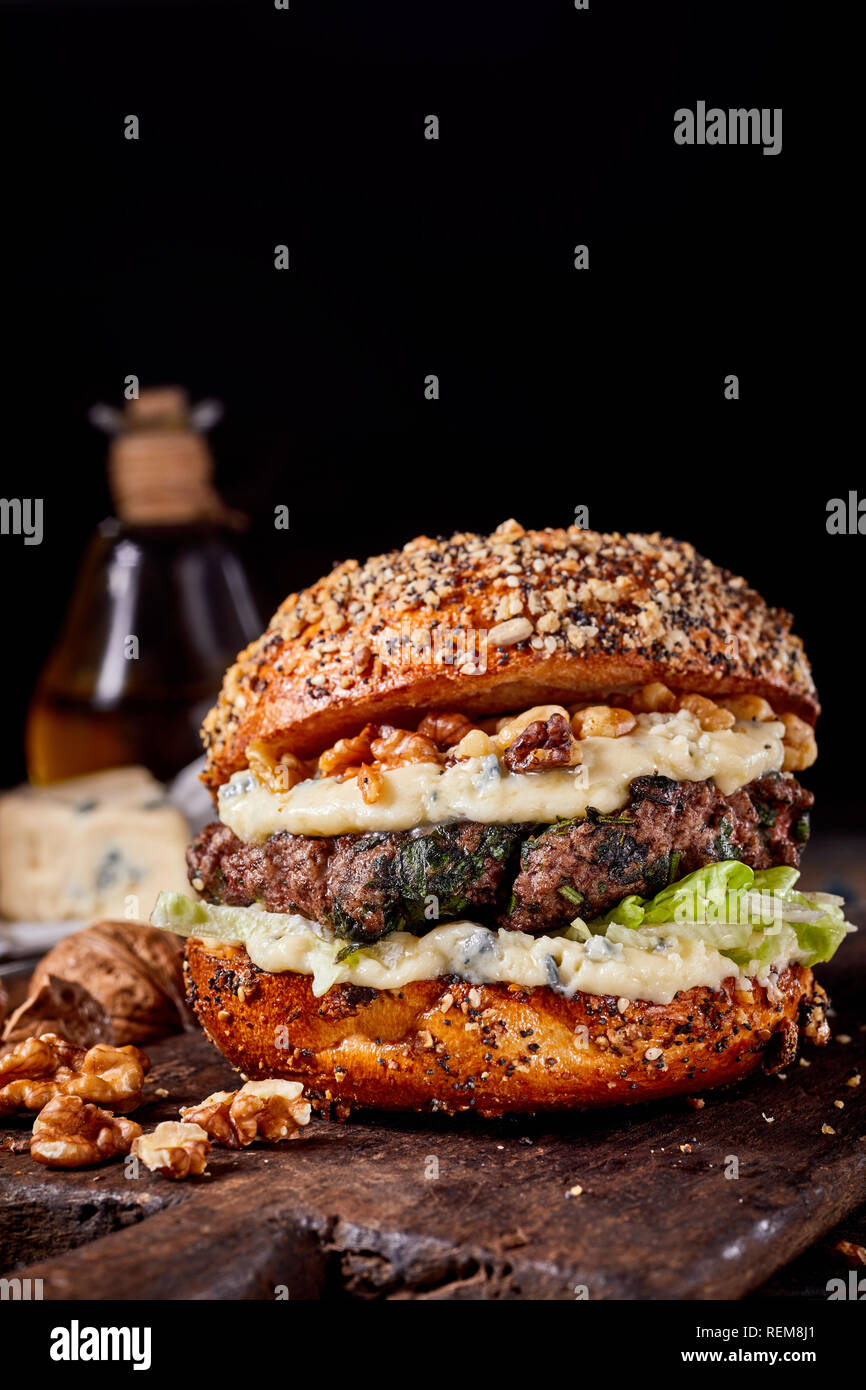 Peaky Blinders Manchester - Peaky Signature Burger ⁠ Ground brisket &  chunk steak patty, golden caramelised onions, black wax cheddar, shredded  lettuce and Peaky burger sauce. Perfectly paired with a cold pint