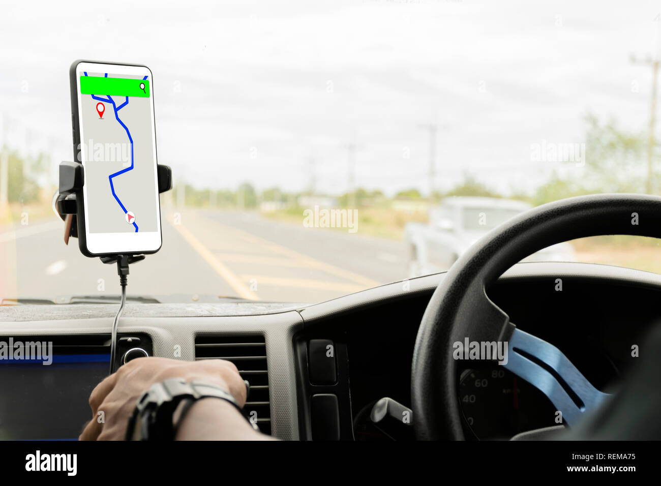 Close-up mobile smart phone inside a car, GPS navigation searching  destination direction or address on gps map Stock Photo - Alamy