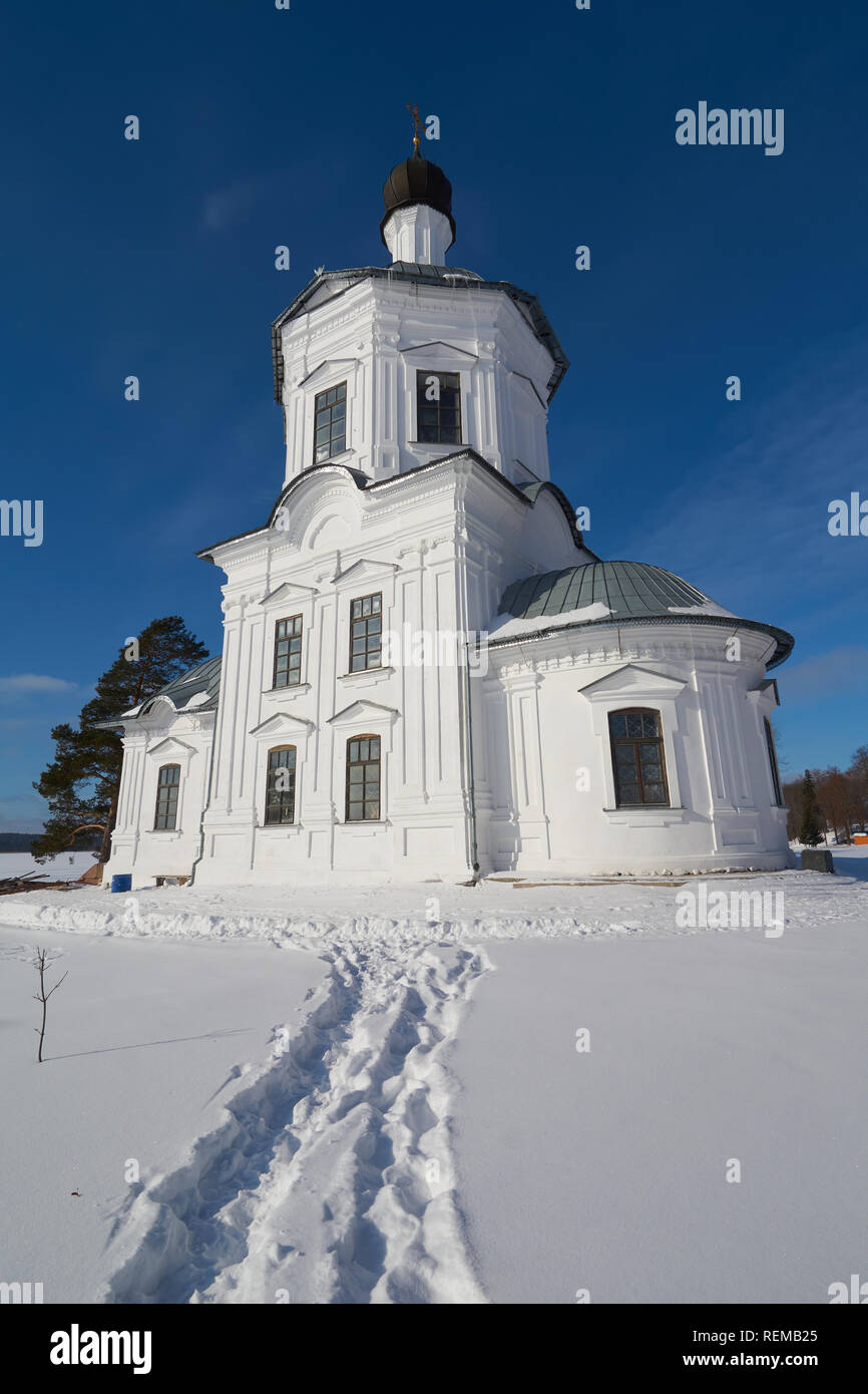 Winter view on the Church of Exaltation of the Holy Cross in russian orthodox monastery of the Nilo-Stolobenskaya Pustyn, Ostashkov district, Tver obl Stock Photo