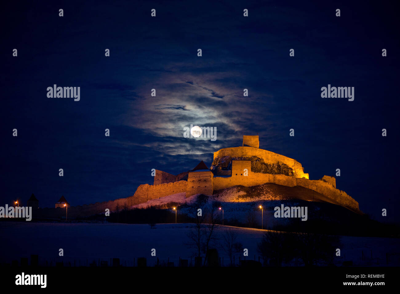 Dracula castle in the mountains in moonlight. Spooky palace in full moon,  graveyard in front. Scary Halloween background Stock Photo - Alamy