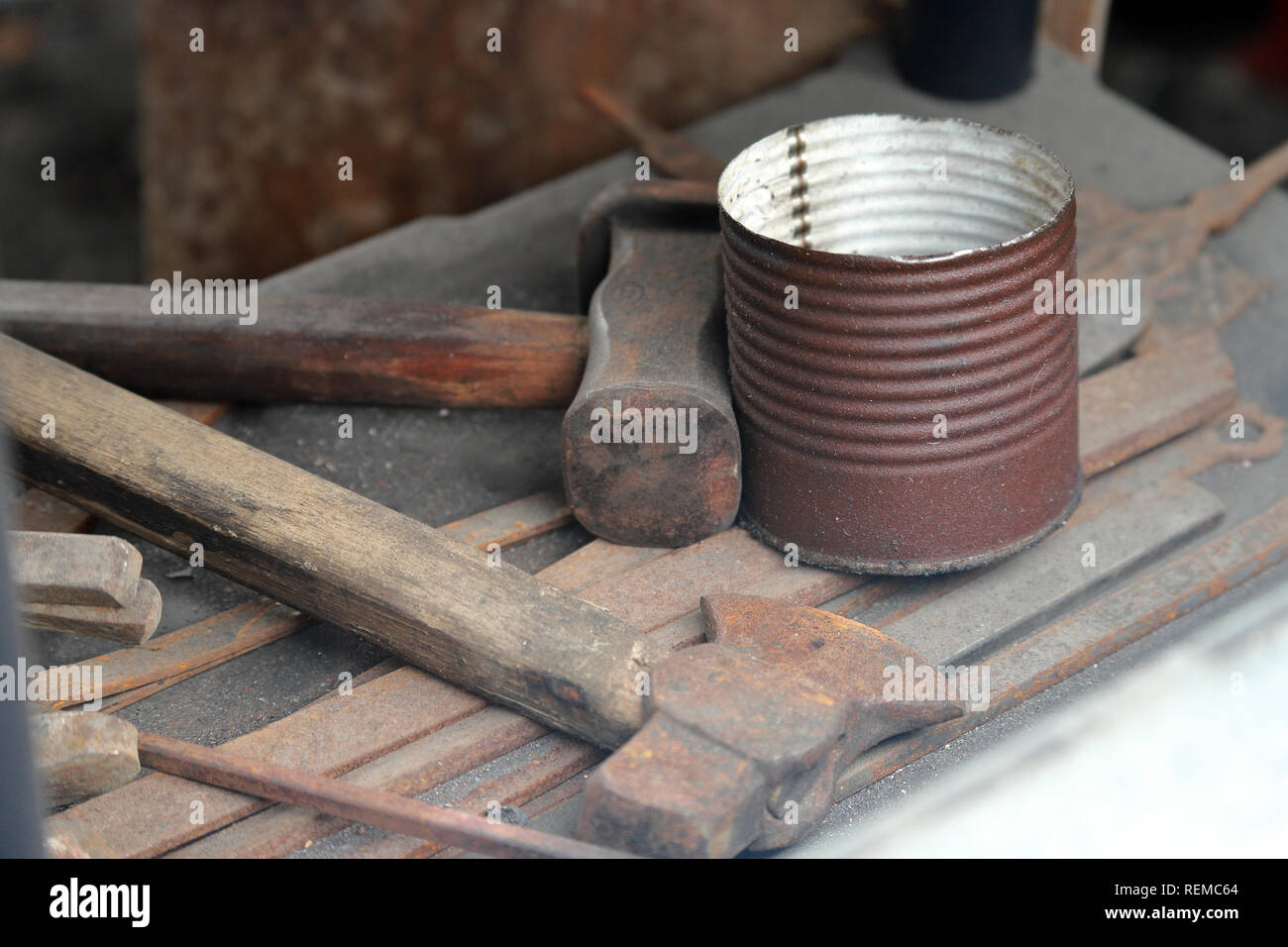 Blacksmith tools old hammer and hatchet Stock Photo