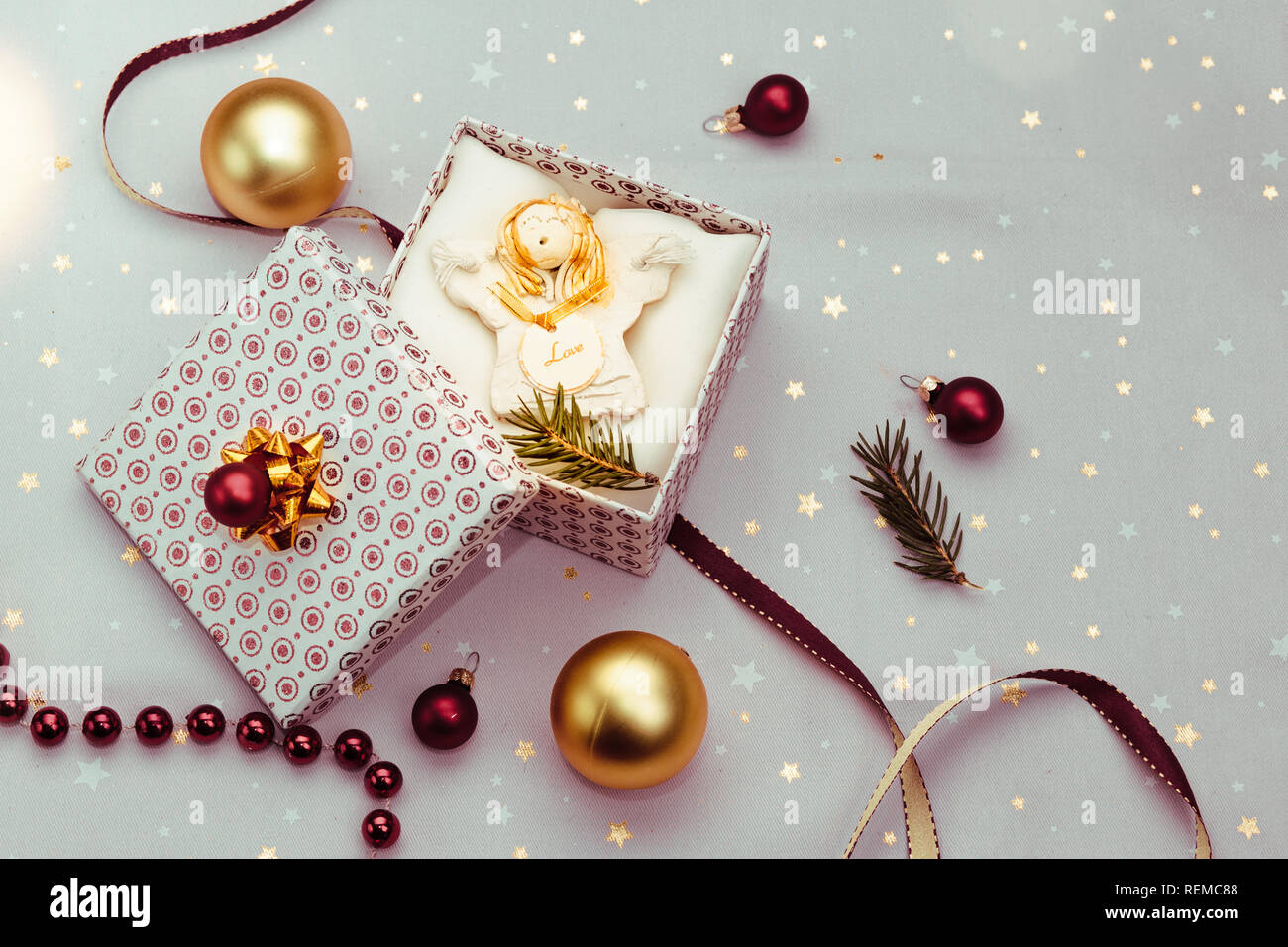 Wrapping Christmas Gift Into Box Decorating Using Red Ribbon Red