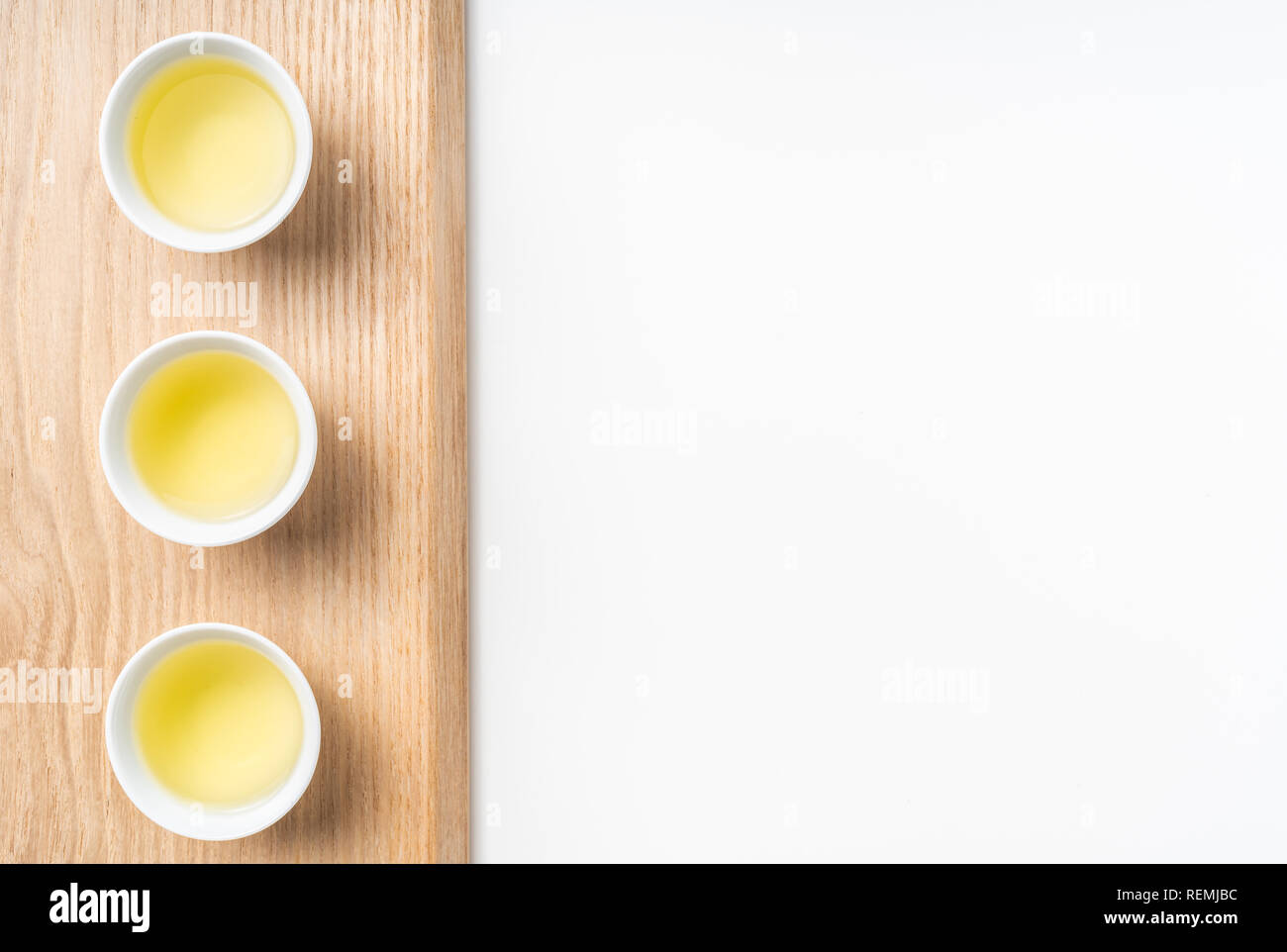 Asia culture and design concept - fresh taiwan oolong tea and cup with wood board Stock Photo