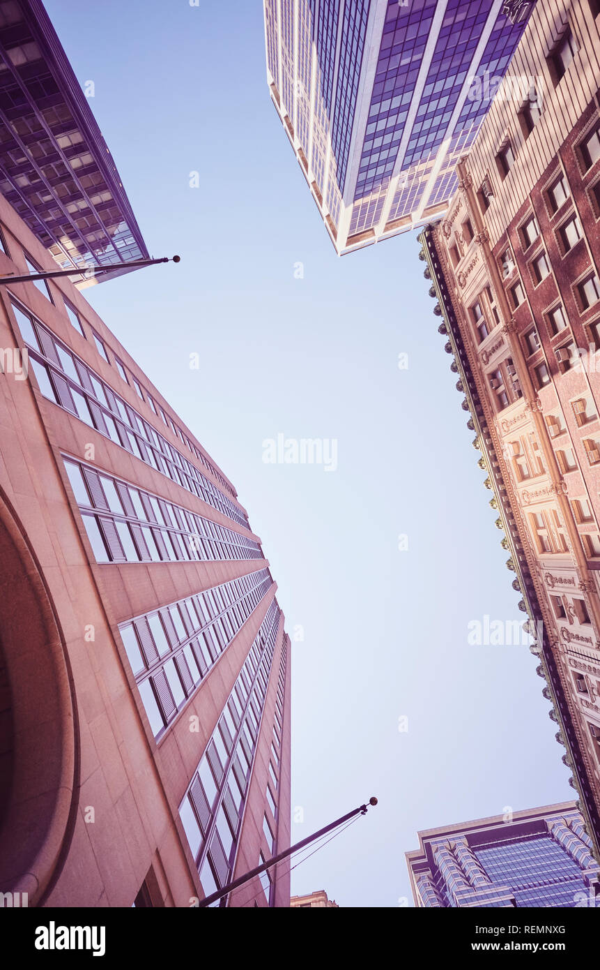 New York buildings, look up perspective, color toning applied, USA. Stock Photo