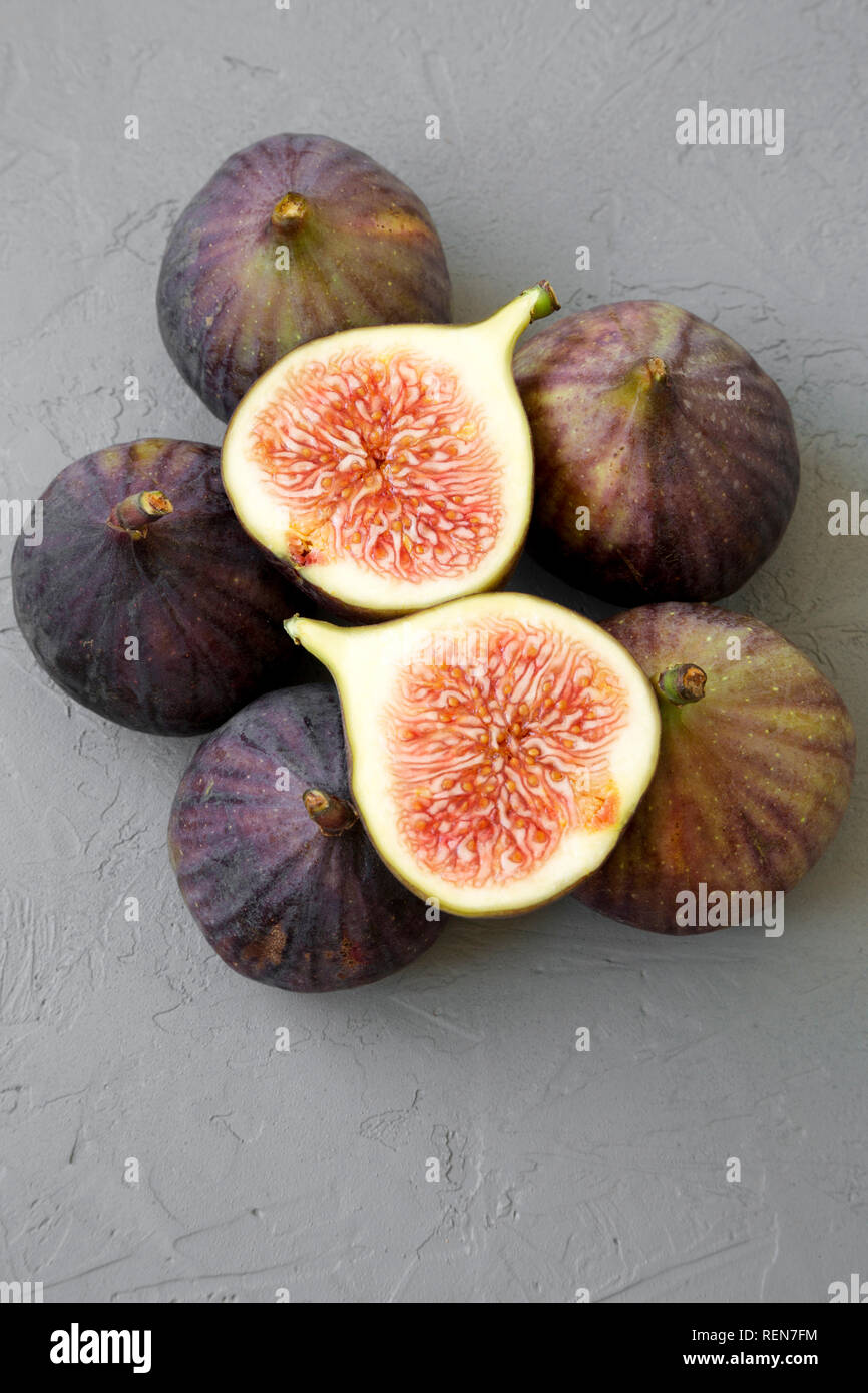 Fresh figs on gray background, top view. Close-up. Stock Photo