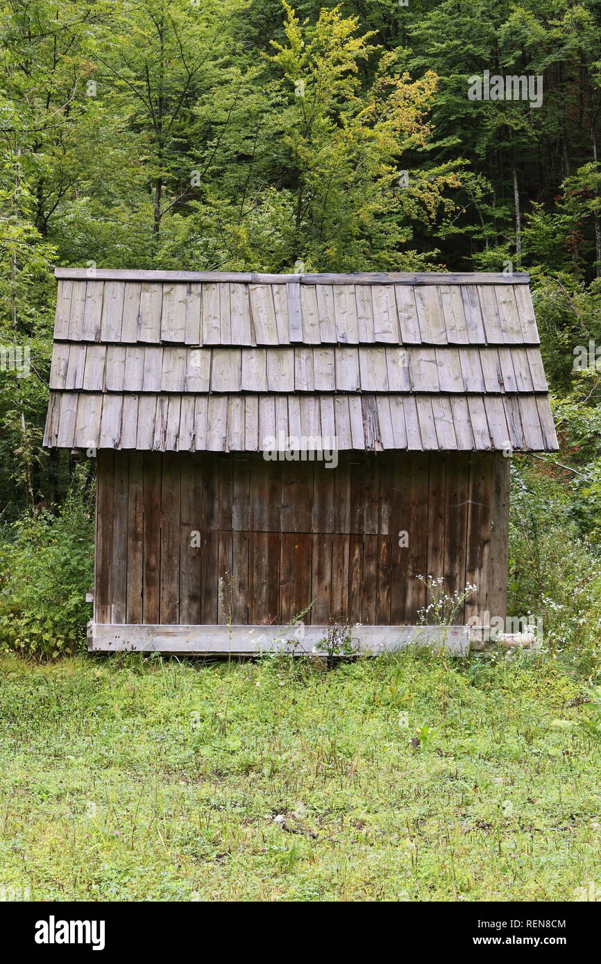 Wooden hut in the mountains at Lake Bohinj, Slovenia Stock Photo