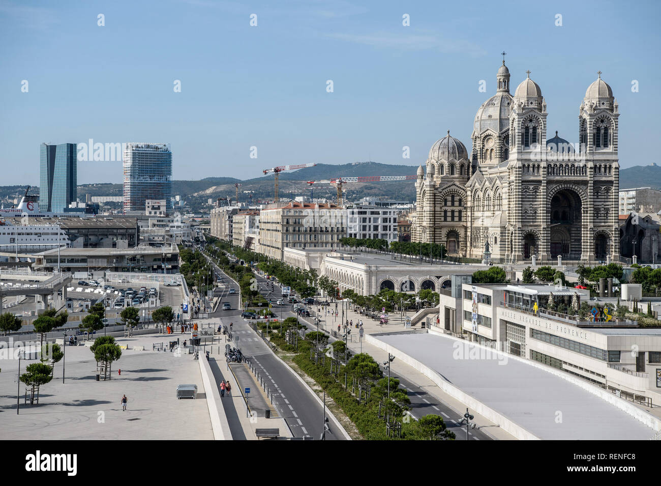 Marseille (south-eastern France): ÒQuai de la JolietteÓ quay with Marseille Cathedral  (ÒCathedrale Sainte-Marie-Majeure de MarseilleÓ) and the ÒCMA C Stock Photo