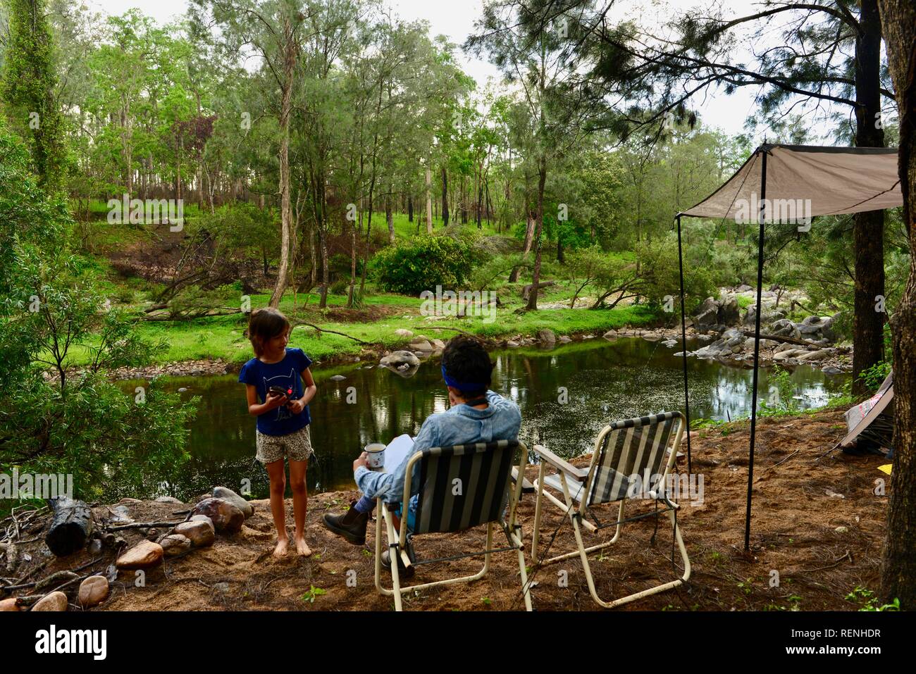 Camping next to Teemburra Creek at Captain's crossing, Mia Mia State Forest, Queensland, Australia Stock Photo