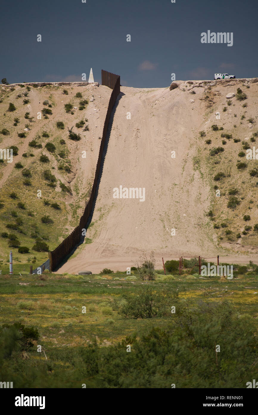 The USMexico Border Fence along a Steep Hill in Sunland Park, New Mexico near El Paso, Texas