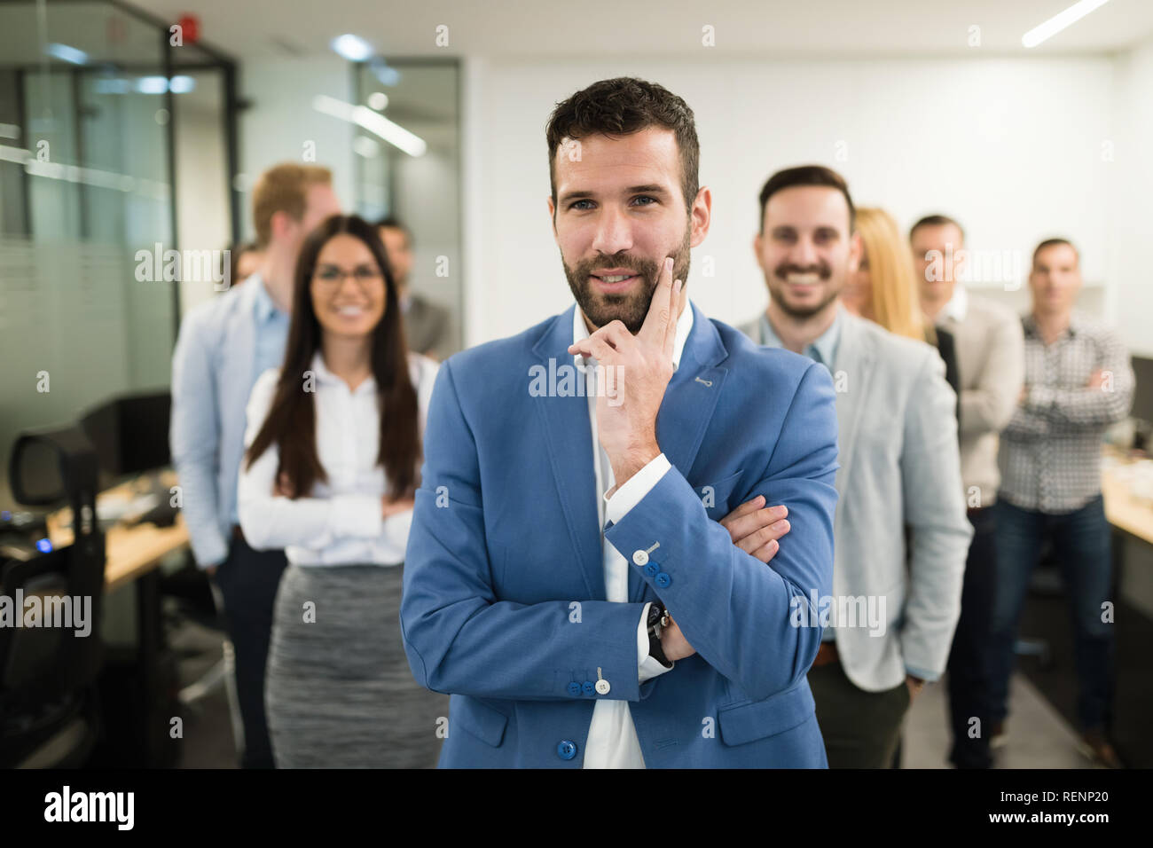 Happy business team posing in hi-res stock photography and images - Alamy