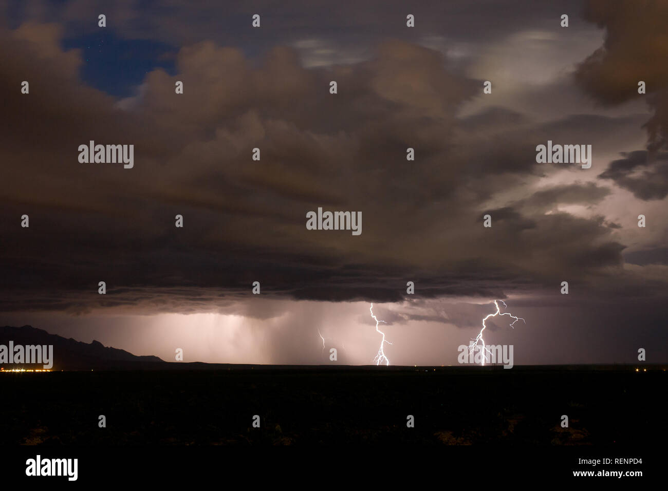 Moonlit Thunderstorm with Downdraft in Southern New Mexico Stock Photo
