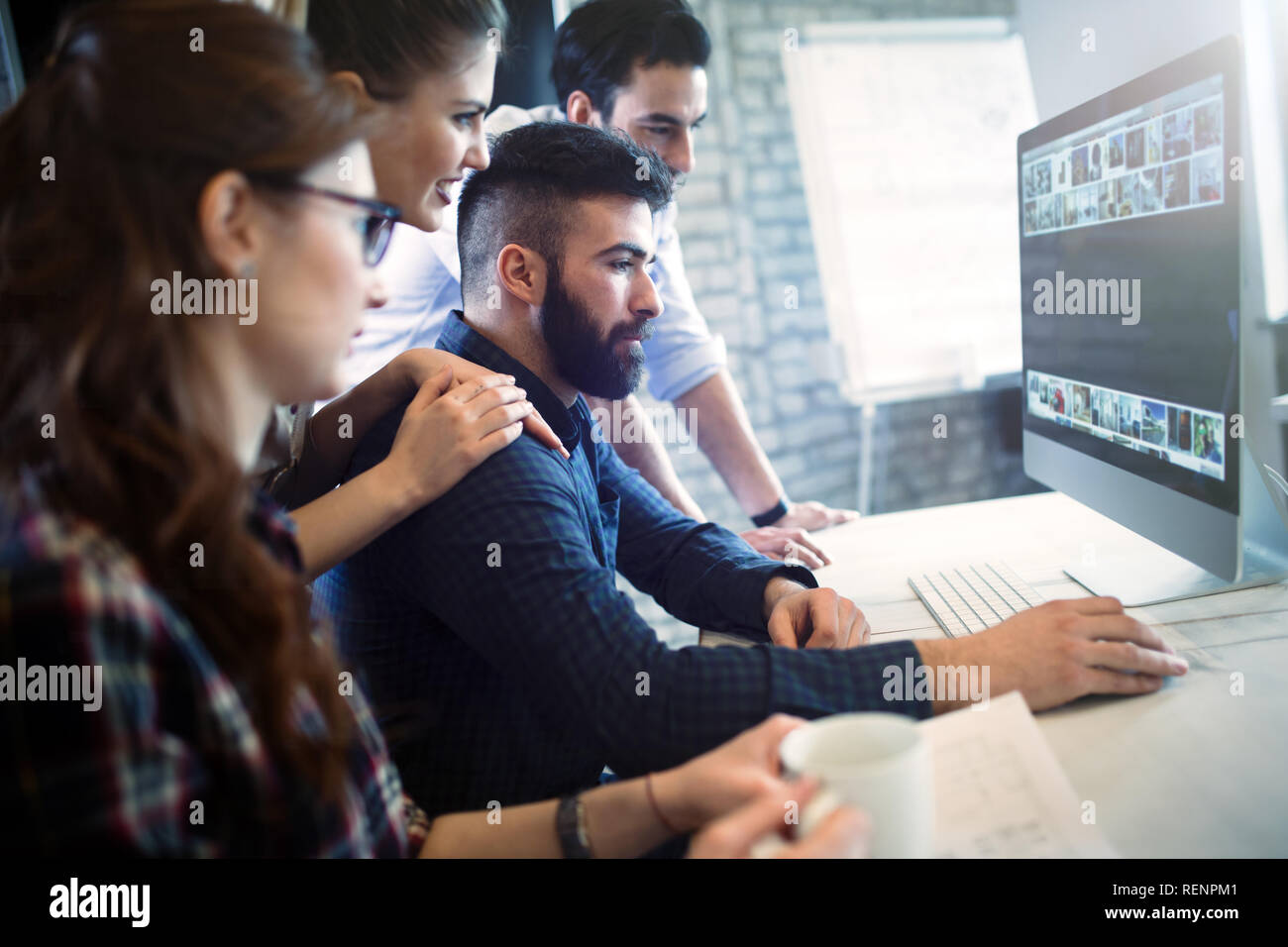 Young architects working on project in office Stock Photo