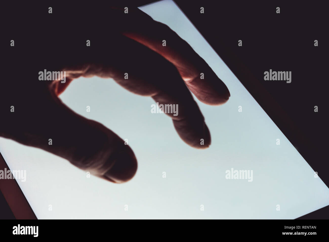 Using tablet hand table hi-res stock photography and images - Alamy