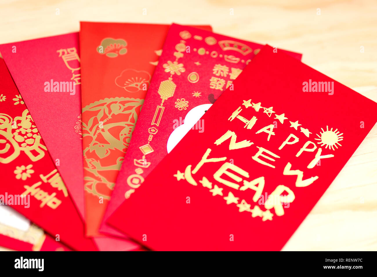 Red Envelope Packet Chinese New Year Hongbao With The Character Happy New Year On Wood Background For Chinese New Year Translation Good Luck In T Stock Photo Alamy
