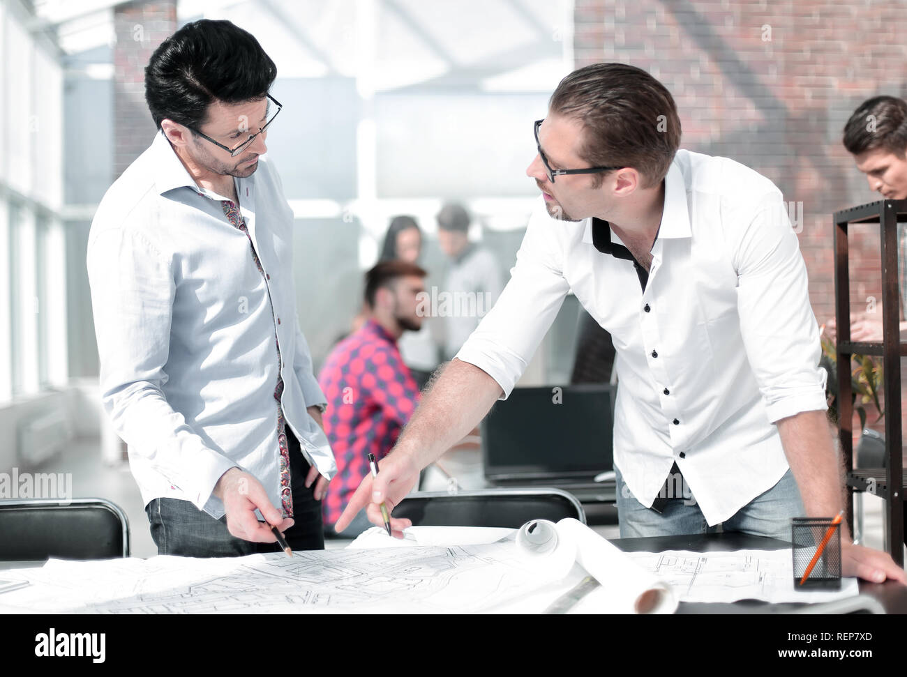 designer and architect discussing ideas for a new project Stock Photo