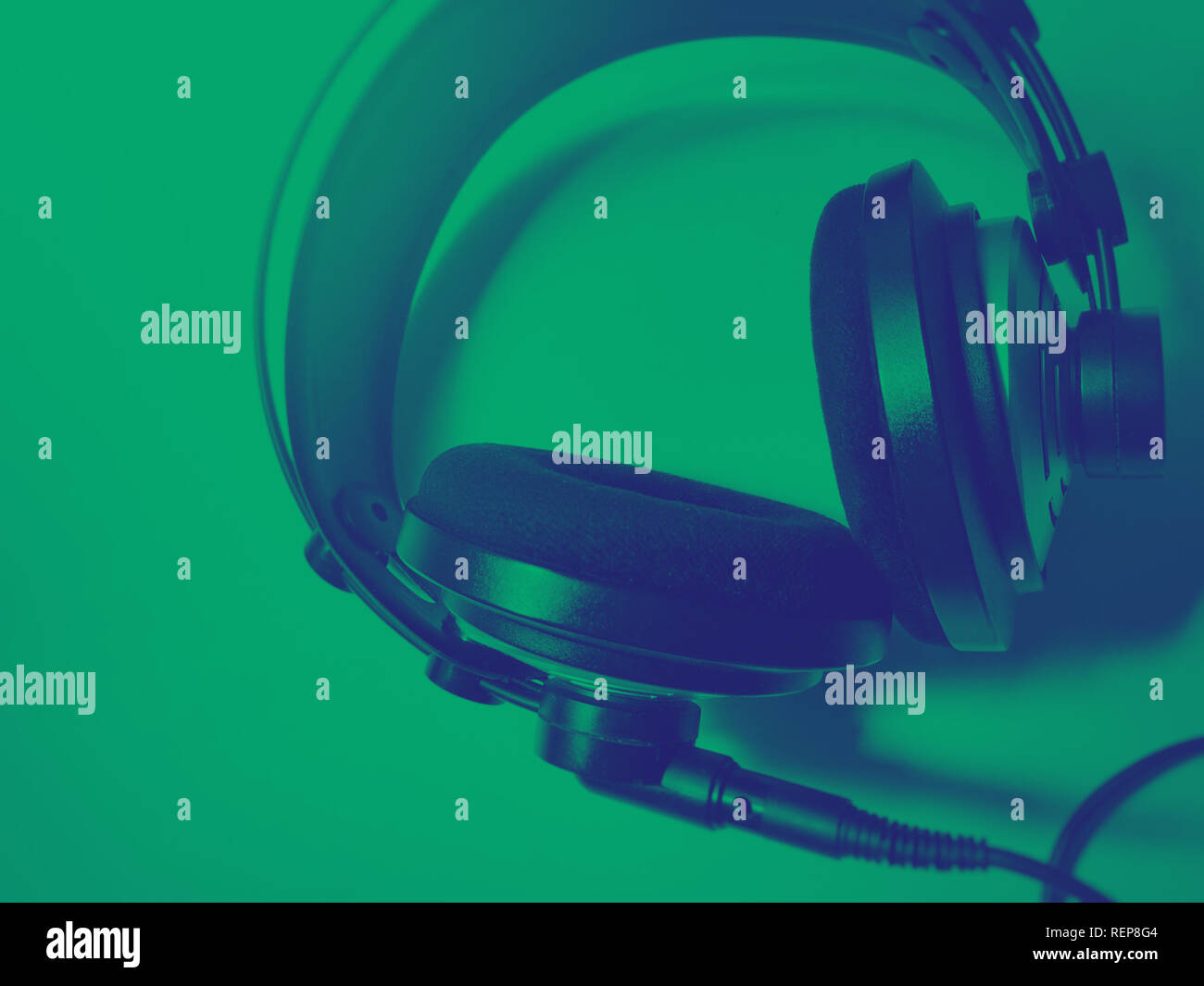 professional headphones in green duotone effect Stock Photo
