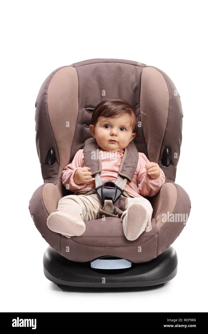 Baby strapped in a car seat isolated on white background Stock Photo