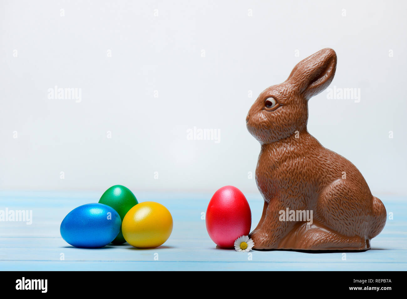 chocolate Easter bunny and Easter eggs Stock Photo