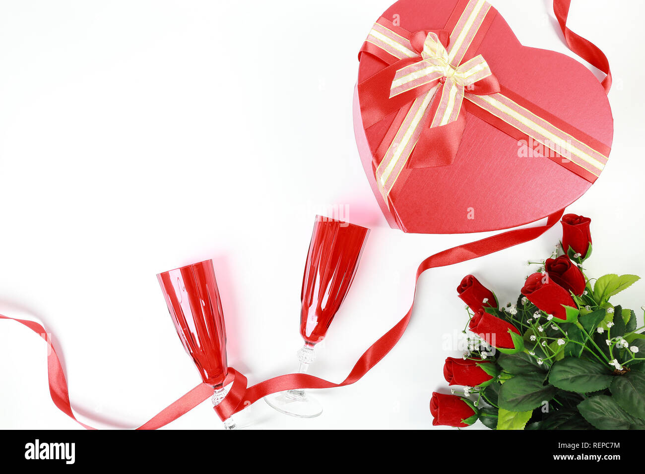 Valentine's Day concept. Heart shaped gift box with ribbon and red ...