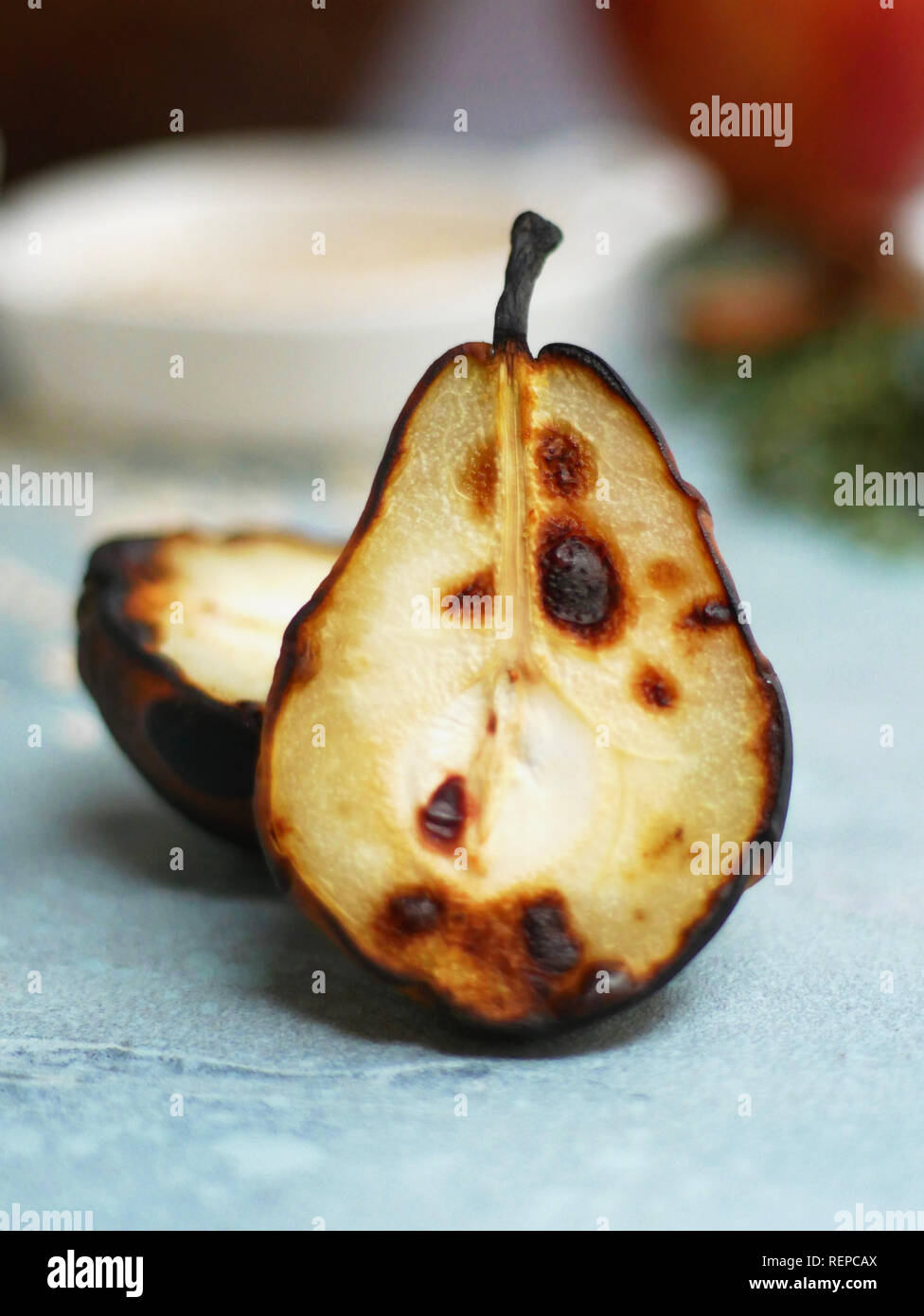 a detail image of a roasted, charred pear Stock Photo