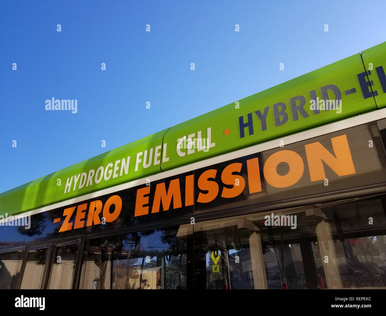 Close-up of text reading Hydrogen Fuel Cell Zero Emission on the side of a city bus in Albany, California, indicating that the bus is powered by a hydrogen fuel cell technology, December 13, 2018. () Stock Photo