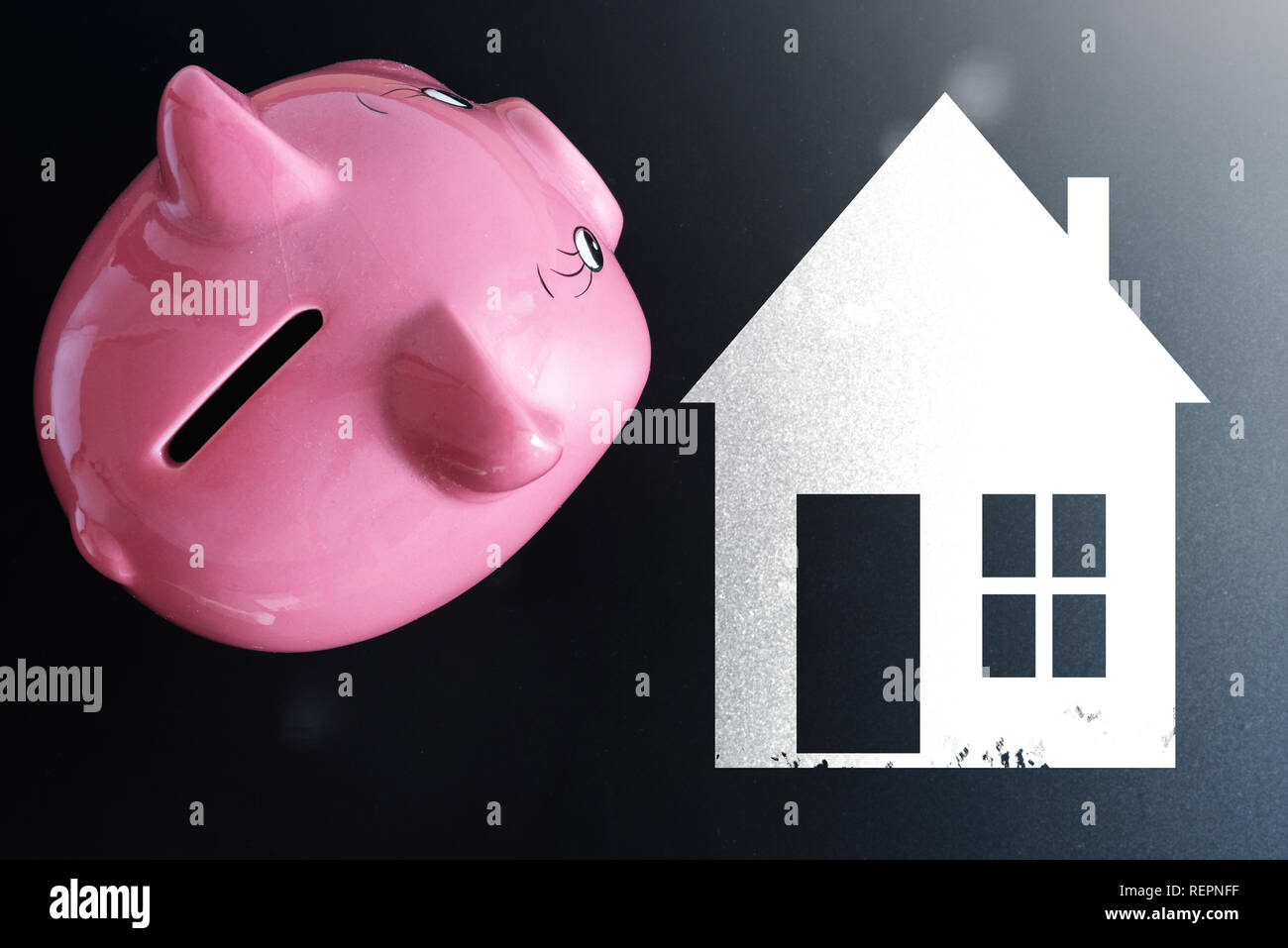 top view of piggy bank and house house purchase concept Stock Photo
