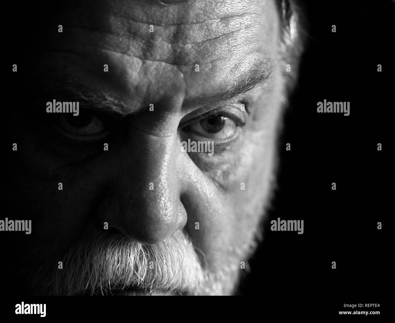 Black and white Portrait of Caucasian man with a mustache and beard Stock Photo