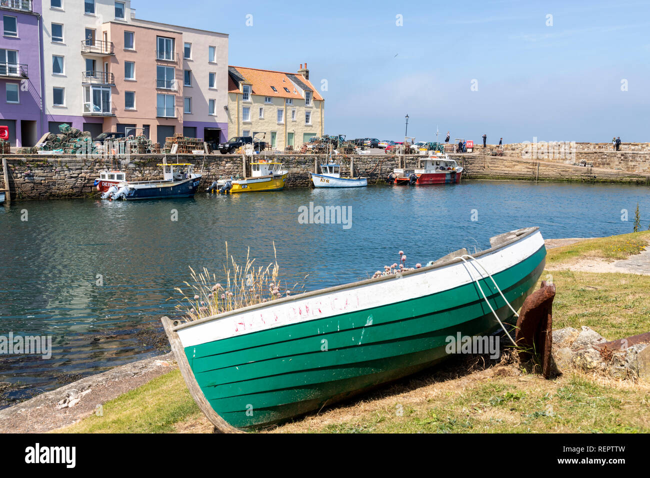 Fishing boats in the harbour at high tide at St Andrews, Fife, Scotland