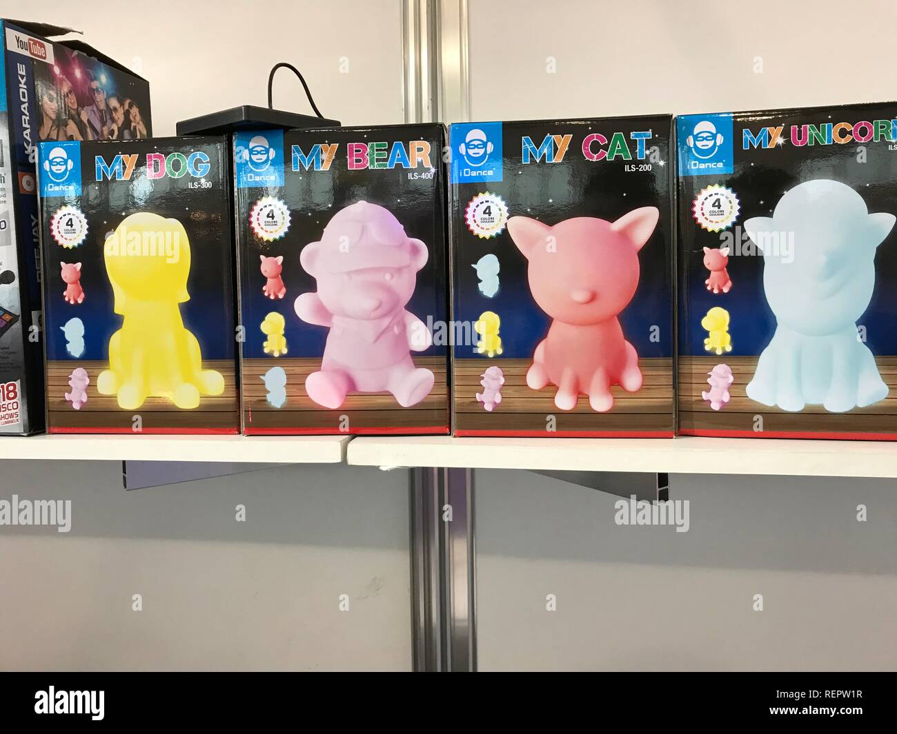 The Dutch firm iDance's new line of light up musical products, called MyUnicorn, also available in the shape of a dog, a bear and a cat, on show at Toy Fair in London. Stock Photo