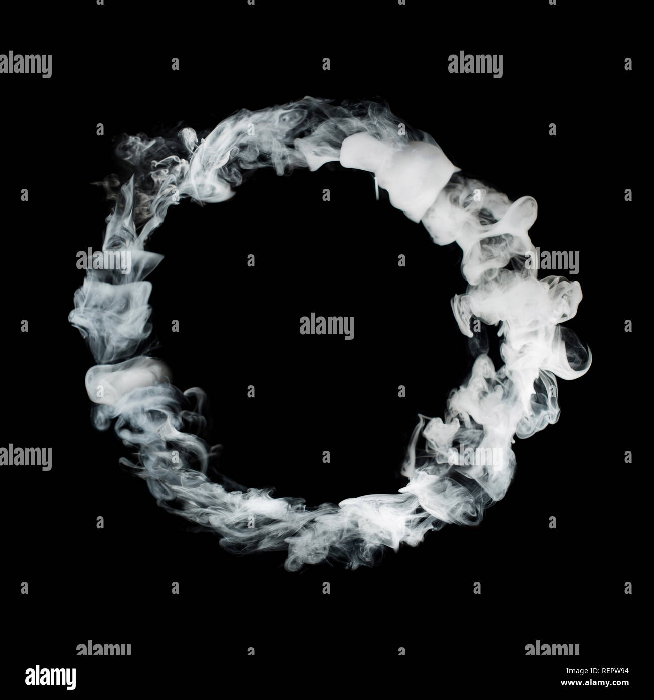 circle from white smoke isolated on black background Stock Photo