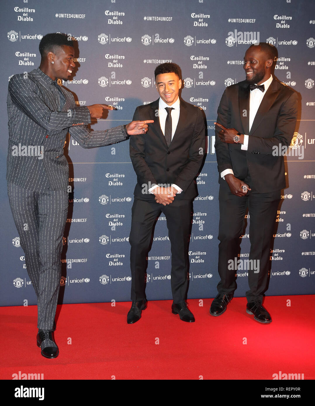 Paul Pogba (left), Jessie Lingard (centre) and Romelu Lukaku during the red  carpet arrivals for the Manchester United United for Unicef Gala Dinner at  Old Trafford, Manchester Stock Photo - Alamy