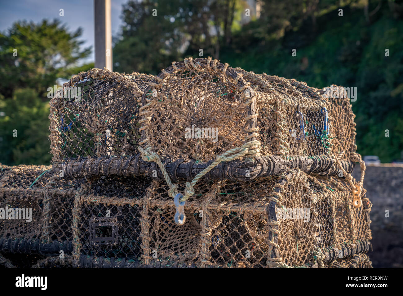 Fish baskets, seen in harbour, Devon, England, UK Stock