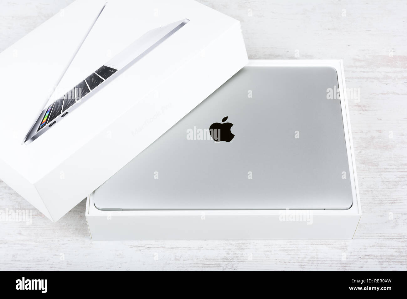 BURGAS, BULGARIA - AUGUST 31, 2017: MacBook Pro Retina Display with Touch bar and a Touch ID sensor integrated into the Power button, made by Apple In Stock Photo