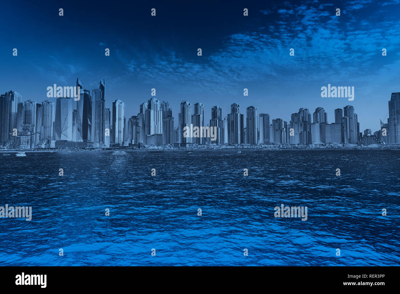 big skyscrapers town landscape, font view cityscape panorama from the sea with waves illustration blue monochromatic Stock Photo