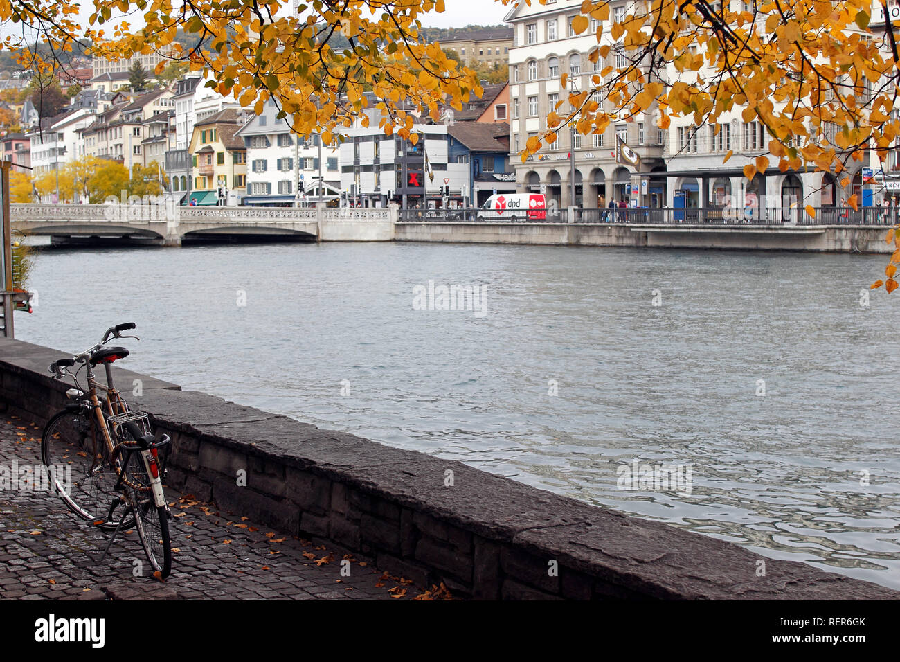Switzerland Zurich Canton Zurich Swiss city on Limmat River and Lake Old Town on river with bicycle Stock Photo