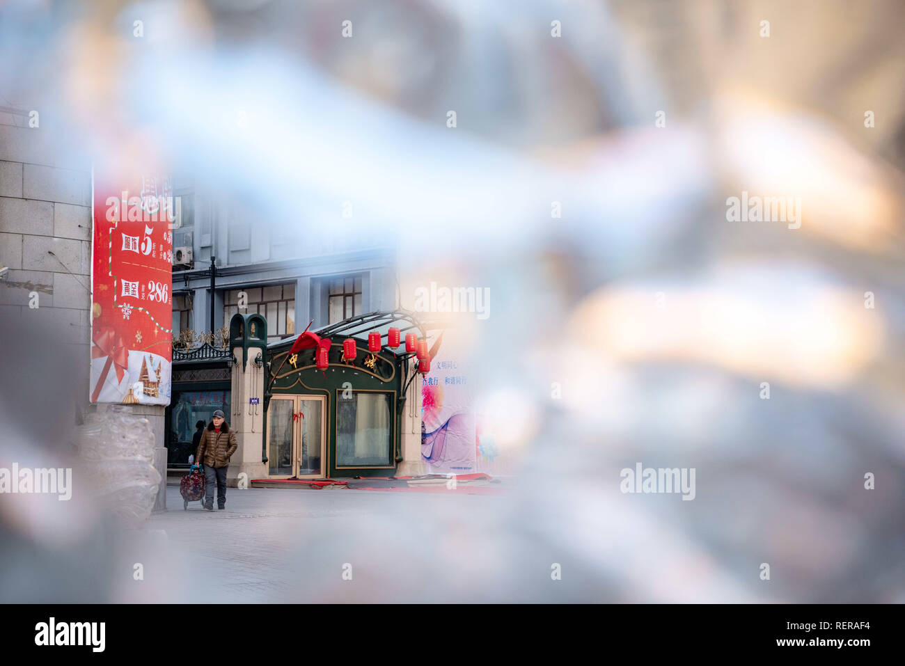 Harbin, Harbin, China. 22nd Jan, 2019. Harbin, CHINA-A glimpse of architectures in Harbin from a hole of ice sculpture in Harbin, northeast ChinaÃ¢â‚¬â„¢s Heilongjiang Province. Credit: SIPA Asia/ZUMA Wire/Alamy Live News Stock Photo