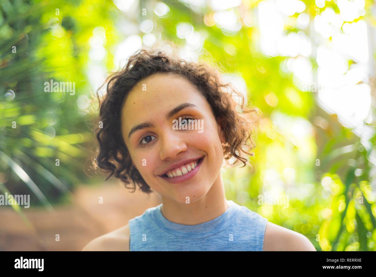 Portrait of a pretty young woman, smiles, Berlin, Germany Stock Photo ...
