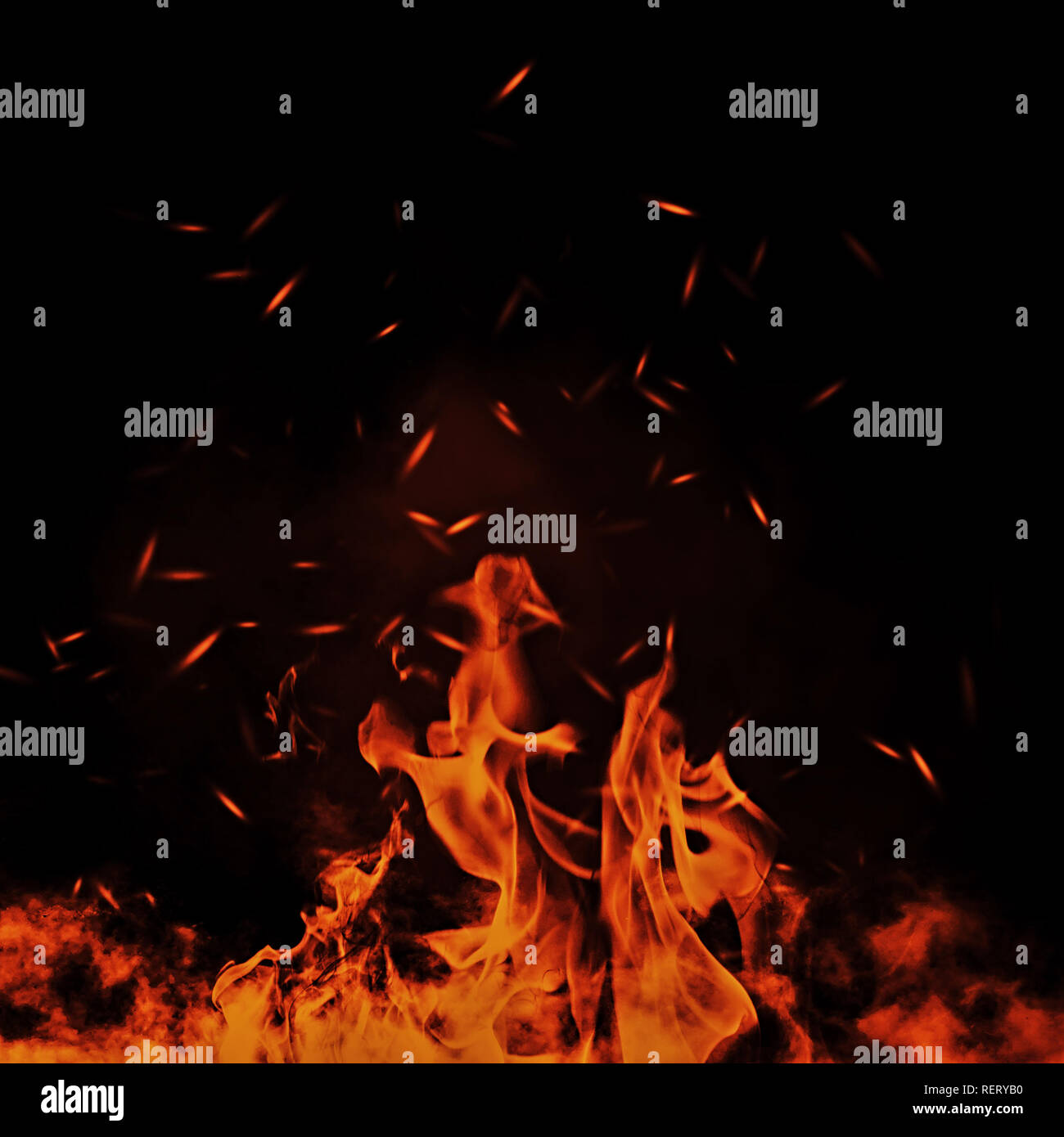 Vintage abstract flames with fire particles embers on isolated background. Stock Photo