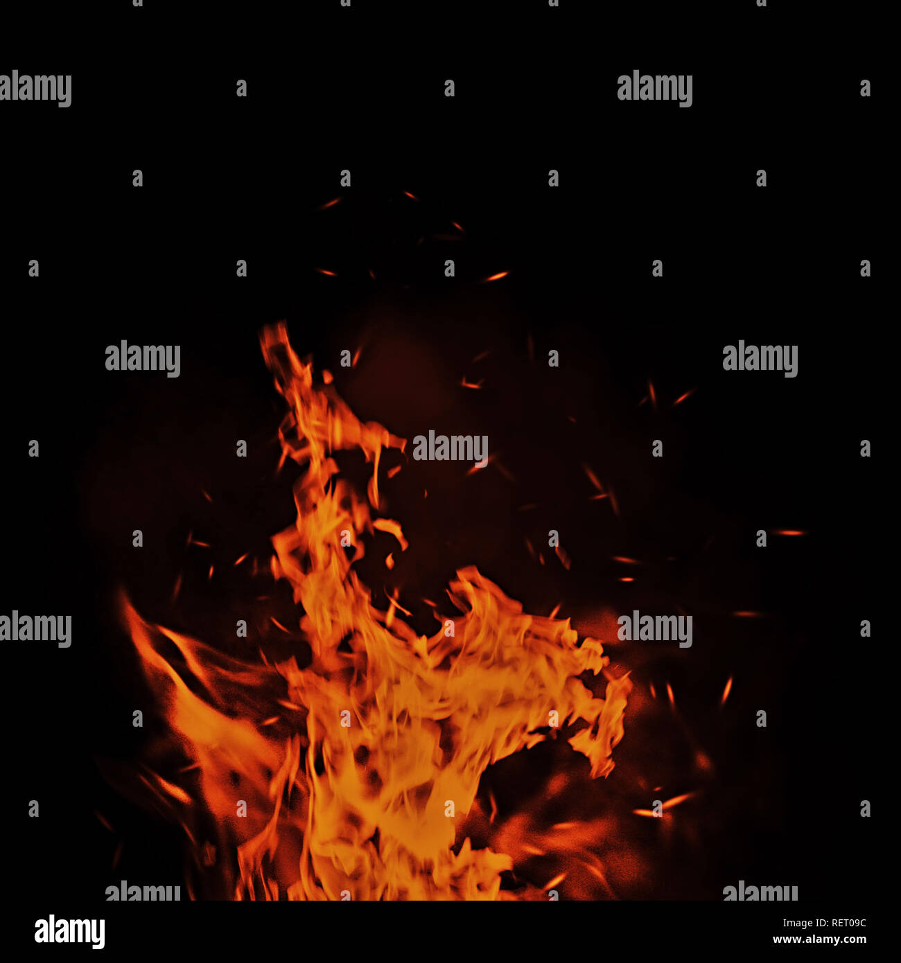 Vintage abstract flames with fire particles embers on isolated background. Stock Photo