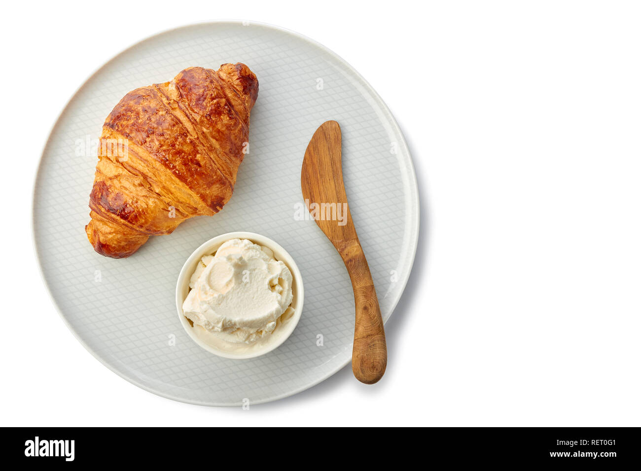 Plate with fresh croissant and cream cheese on white Stock Photo
